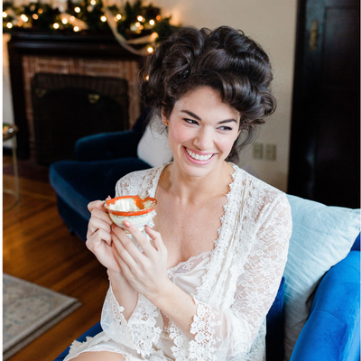 Bride dressed in vintage wedding lingerie getting ready at Willowdale's Bridal Suite on North Shore, MA