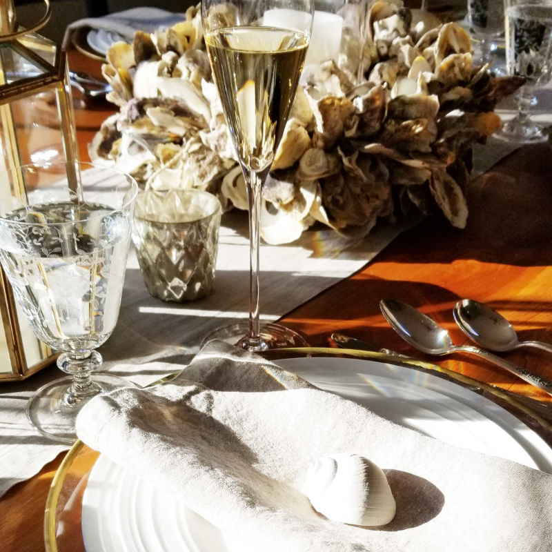 Champagne and Etched glassware rentals Springfield, Massachusetts on Tablescape with Oyster Wreaths