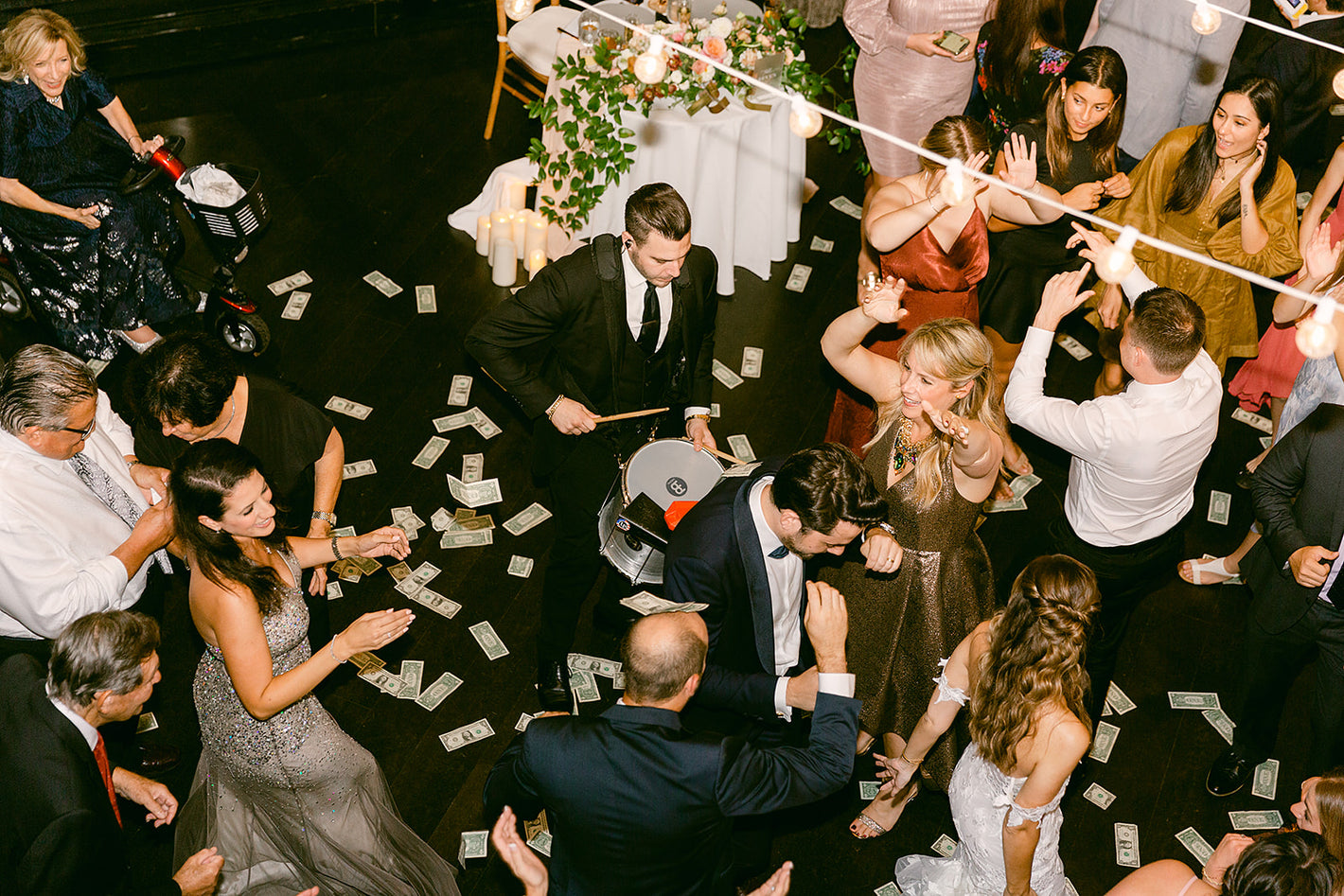 traditional greek money dance being performed at a Boston wedding venue