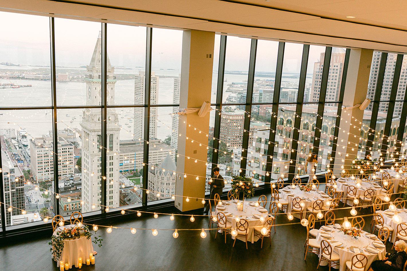 View of Ballroom at the State Room overlooking Boston waterfront.