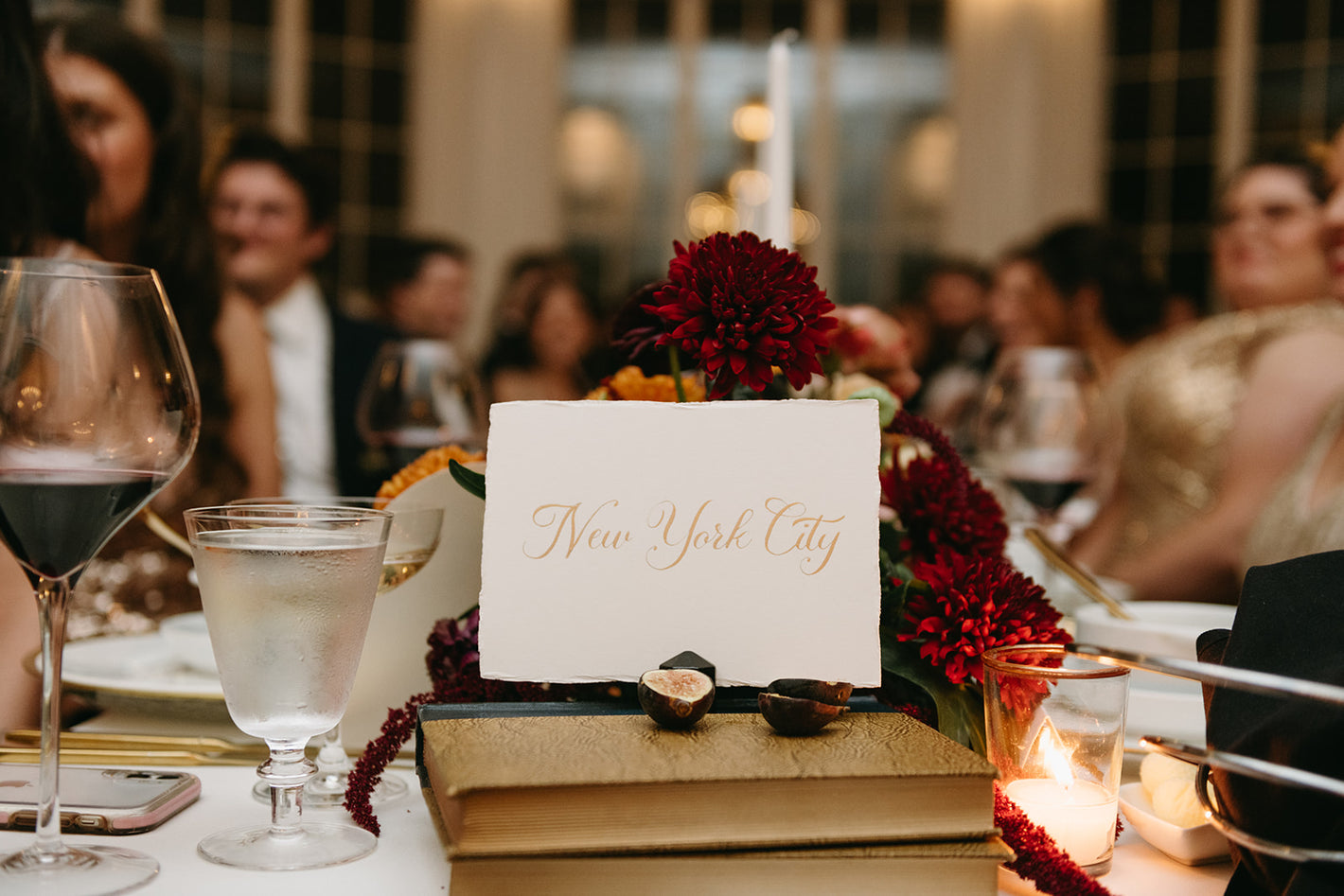 Vintage tablescape with vintage books and glassware rental of wine glasses and goblets Massachusetts
