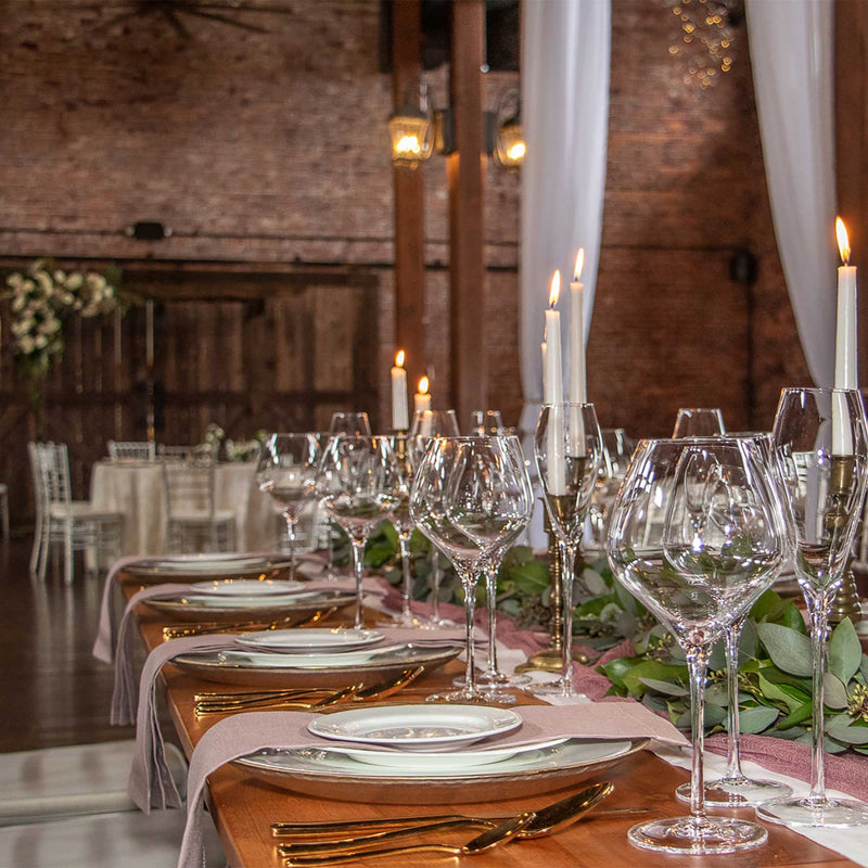 south shore wedding reception at winery with linen and brass candlestick rentals