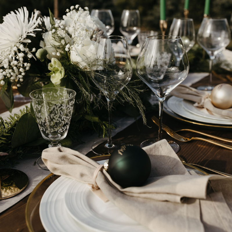 Winter Tablescape with Ornaments and Godl Rimmed Chargers Springfield, Massachusetts