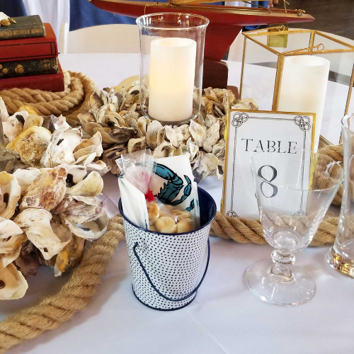 Clambake decor rental in New England with lighting