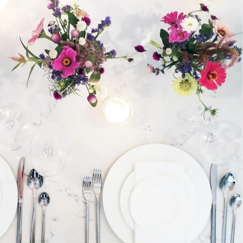 bright florals and wedding flatware from rental shop boston mass