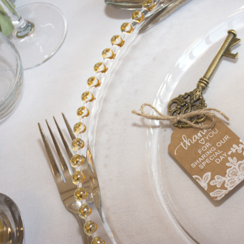 Gold beaded charger at place setting in Springfield Massachusetts