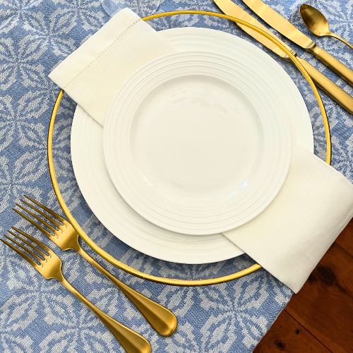 Matte Gold Flatware set with Gold Rimmed Charger at Place Setting for Event in Boston, MA
