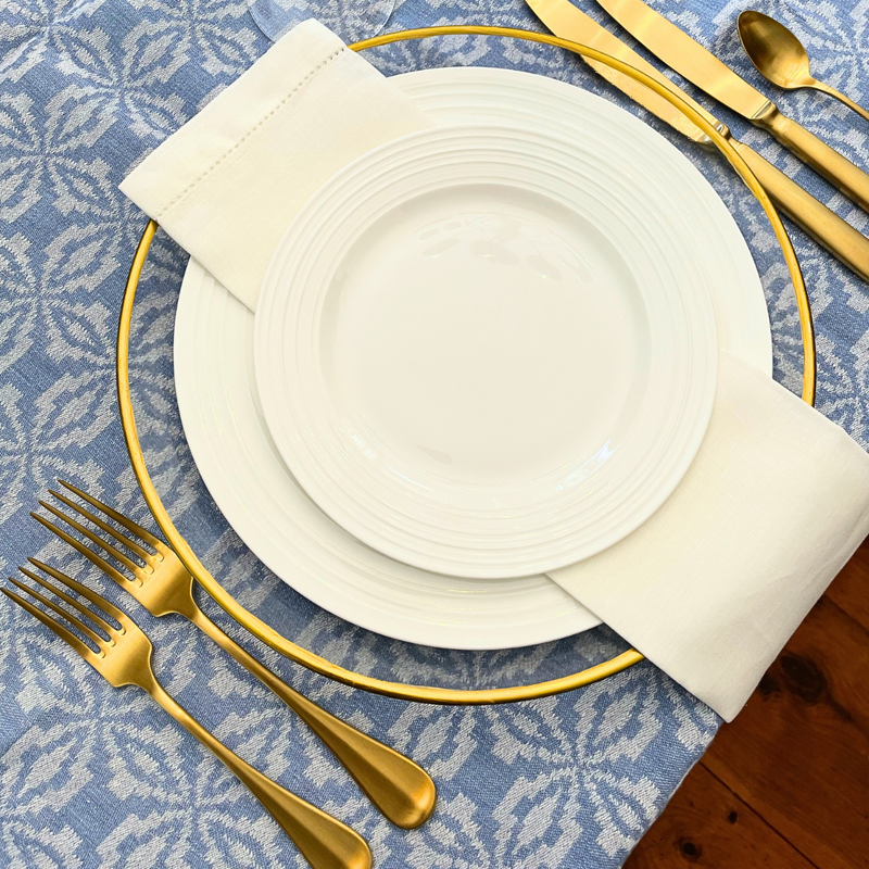 Matte Gold Flatware set with Gold Rimmed Charger at Event in Providence., Rhode Island