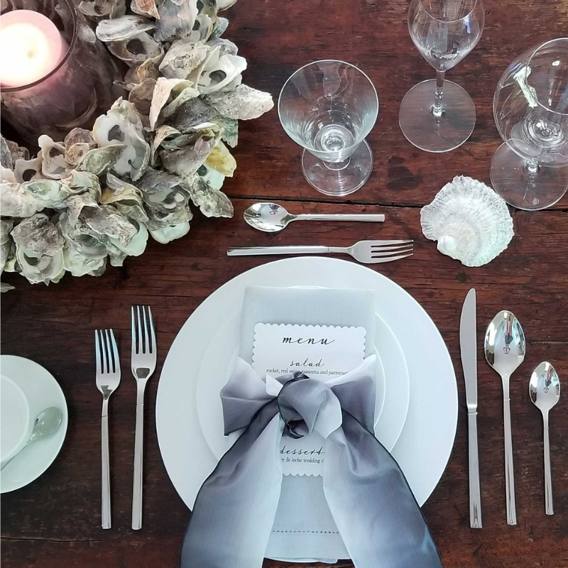 Seaside tablescape in Boston Massachusetts with stainless steel polished flatware
