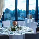 tablescape with globe and cotton blend linen at venue in new england